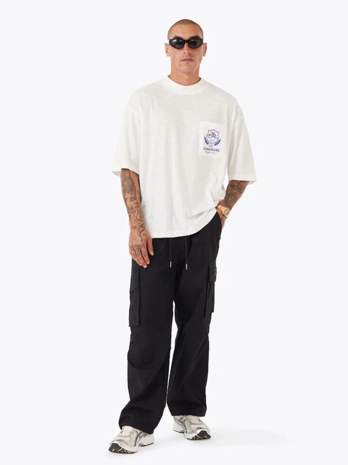 Image of a model wearing Tops. Productname: Zanerobe Crest Slub Flow Tee in Vintage White colour by brand - Zanerobe