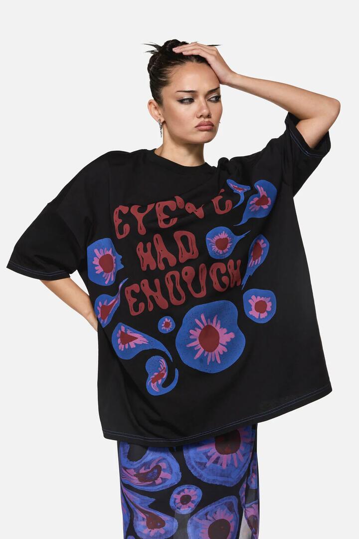 Image of a model wearing Tops. Productname: Eye've Had Enough Oversize Tee in Black colour by brand - Black Friday