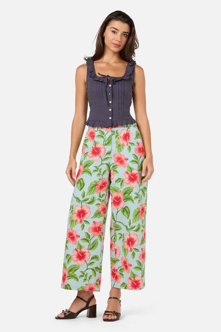 Image of a model wearing Pants. Product name - Hibiscus Summer Pant in Blue colour by brand - Princess Highway