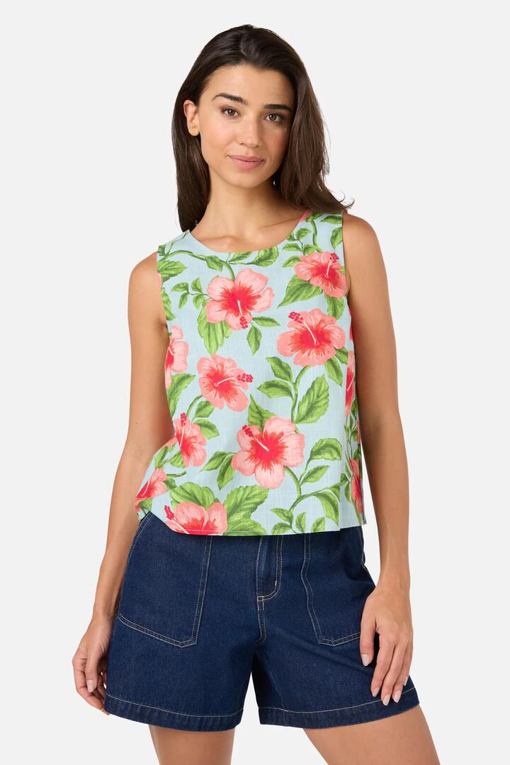 Image of a model wearing Tops. Product name - Hibiscus Summer Shell Top in Blue colour by brand - Princess Highway