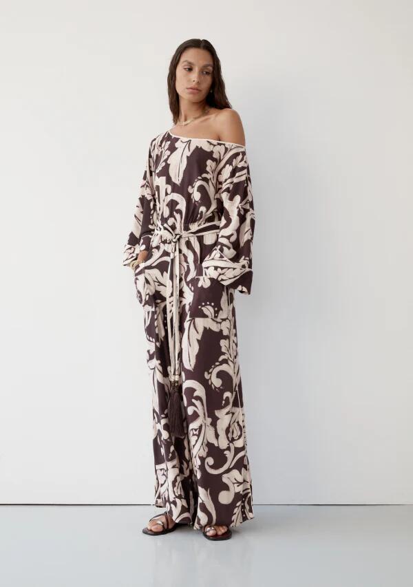 Image of a model wearing Outerwear. Productname: Seraphine Jumpsuit in Seraphine Print colour by brand - MOS The Label