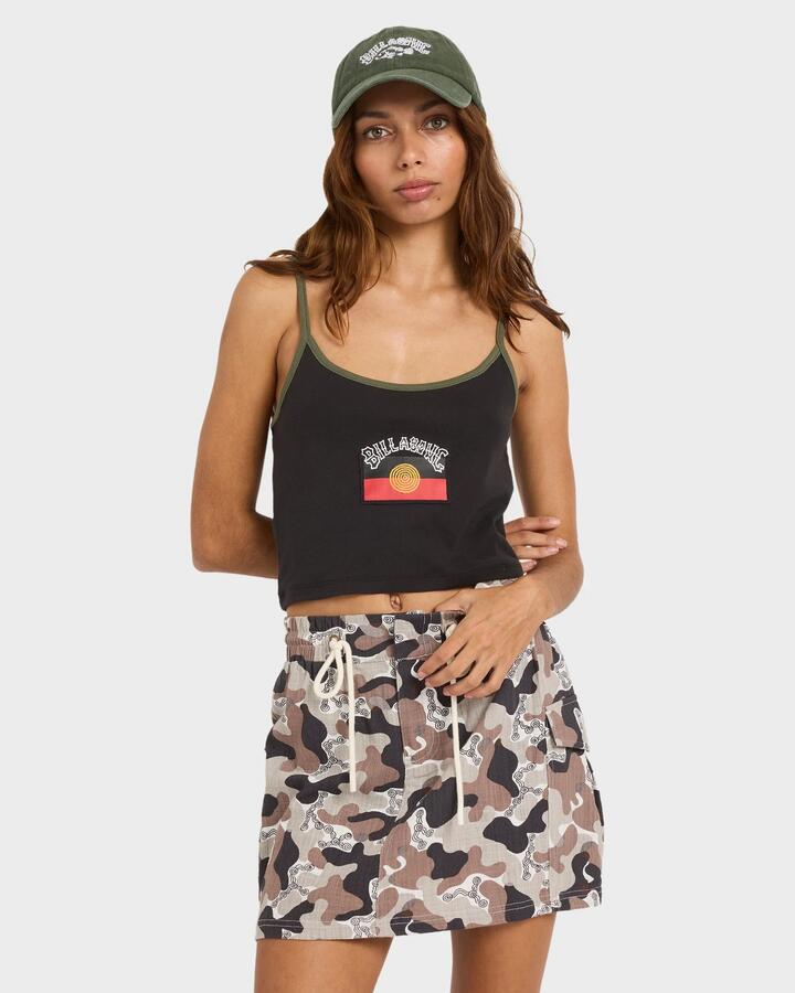 Image of a model wearing Tops. Product name - Billabong Womens Otis Flag Cropped Tank Black in Black colour by brand - Billabong
