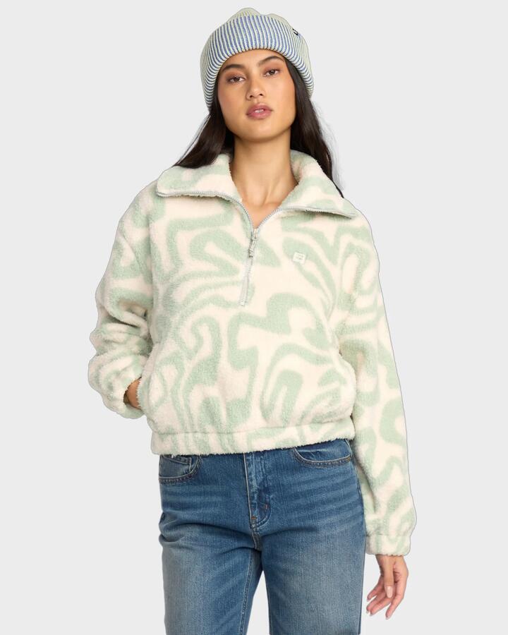 Image of a model wearing Outerwear. Product name - Billabong Womens Barra Half Zip Pullover Green Haze in Green Haze colour by brand - Billabong