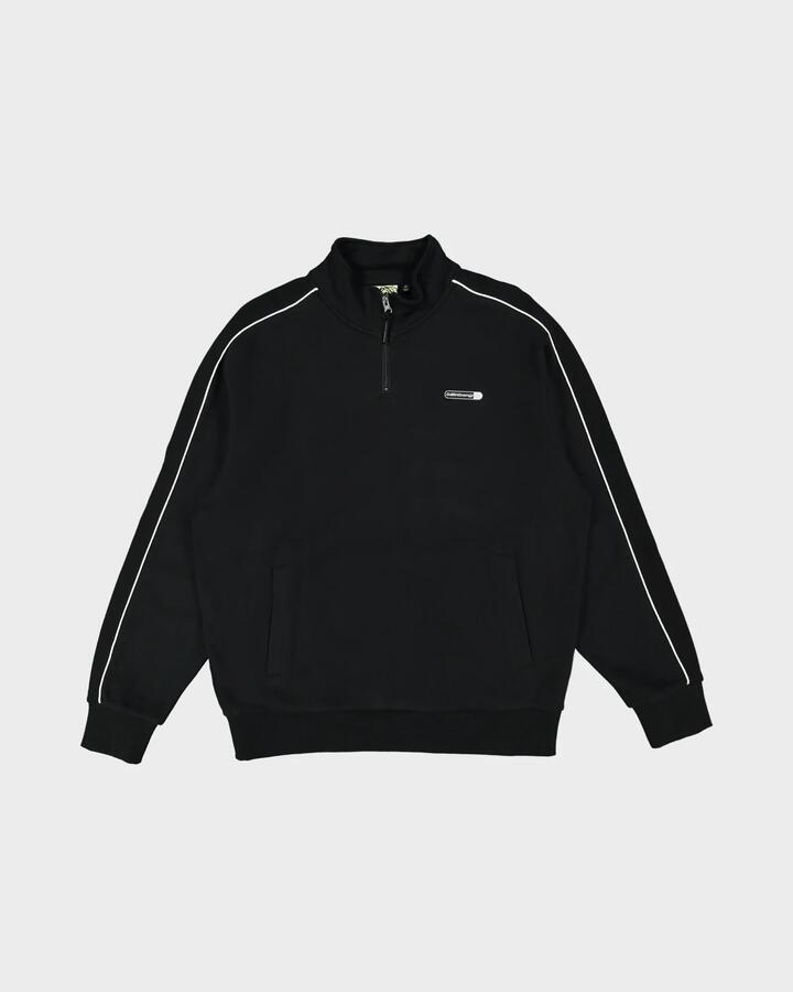 Image of a model wearing Outerwear. Product name - Billabong Mens Spec Panelled 1/4 Zip Mock Neck Fleece Top Black in Black colour by brand - Billabong