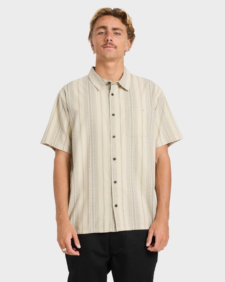 Image of a model wearing Tops. Productname: billabong - Mens Sundays Jacquard Short Sleeve Shirt - Oatmeal - in Oatmeal colour by brand - billabong