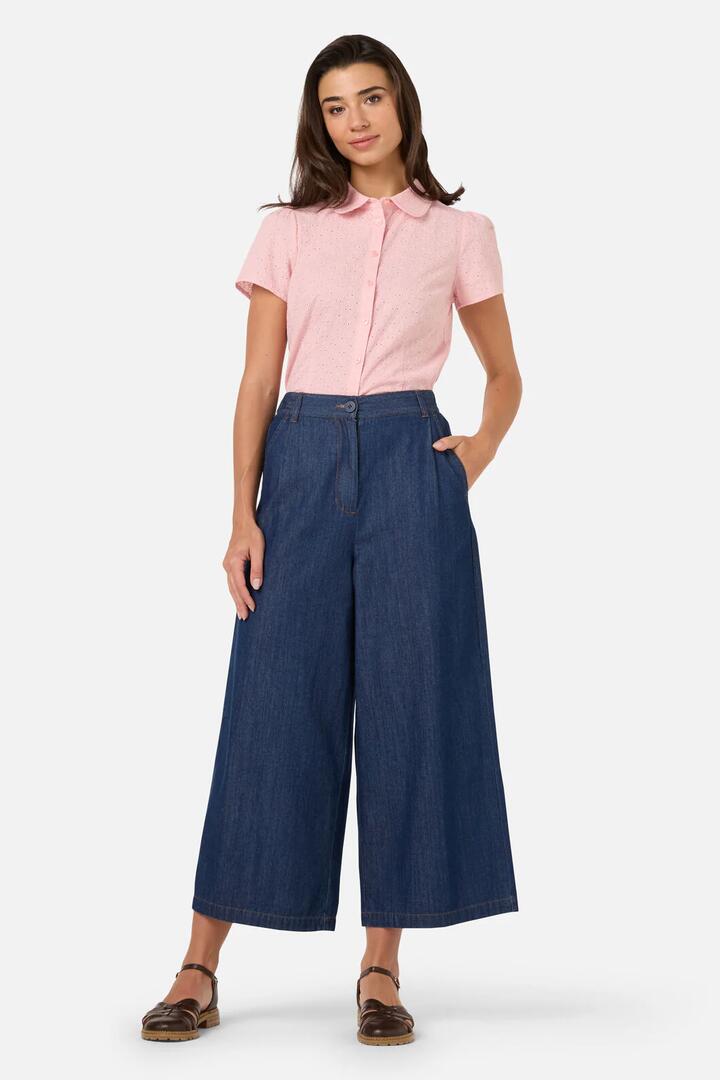 Image of a model wearing Pants. Product name - Joe Chambray Denim Culotte in Blue Denim colour by brand - Princess Highway