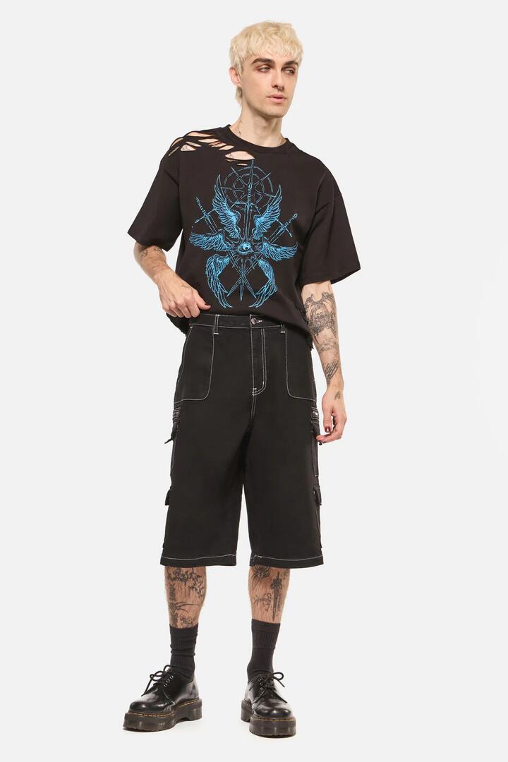 Image of a model wearing Shorts. Product name - Heathen Goth Pocket Jorts in Black colour by brand - Dangerfield