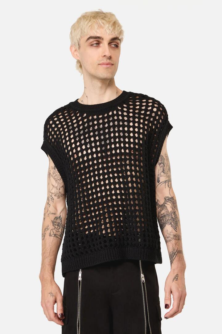 Image of a model wearing Tops. Product name - Victory Knit Top in Black colour by brand - Black Friday