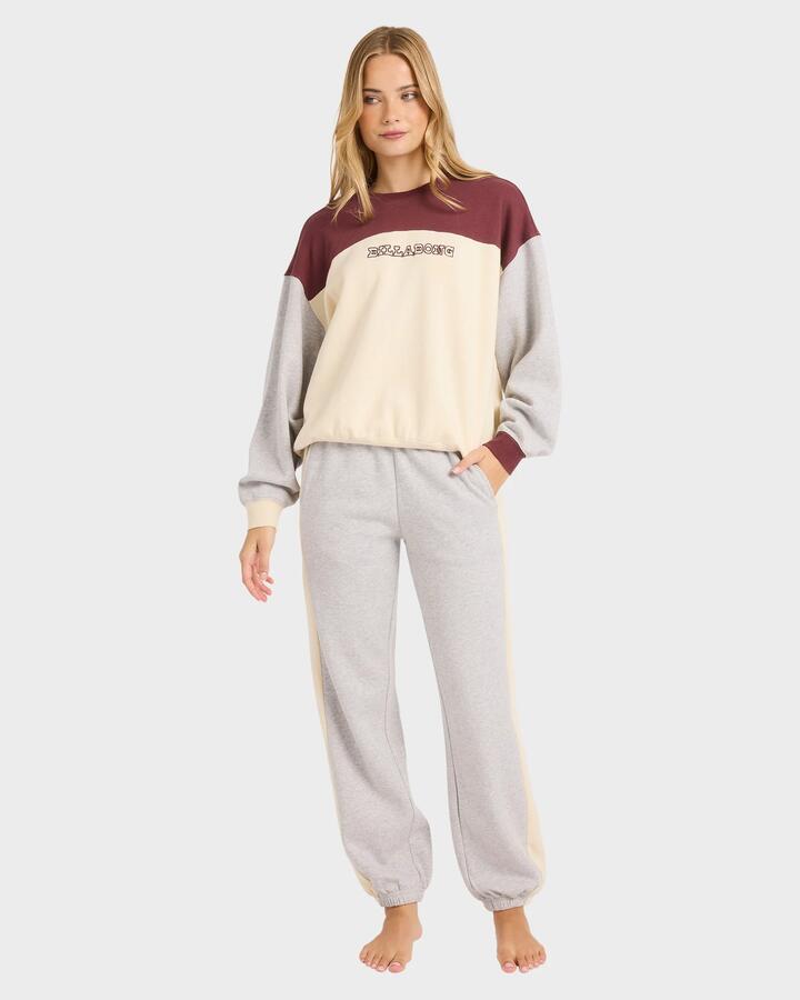 Image of a model wearing Outerwear. Product name - Billabong Womens Get It Fleece Sweatpants Heather Grey in Heather Grey colour by brand - Billabong
