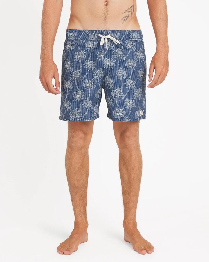 Image of a model wearing Shorts. Product name - RVCA Mens Exotica Elastic 2 16" Swim Shorts Dark Denim in Dark Denim colour by brand - RVCA
