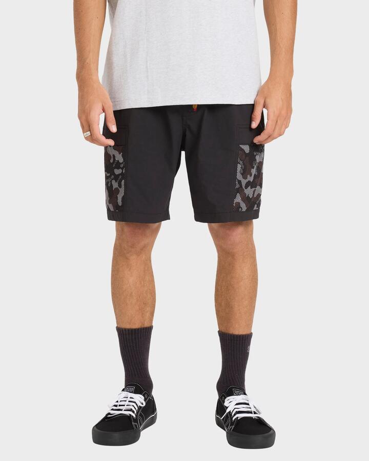 Image of a model wearing Shorts. Product name - Billabong Mens Otis Mesh 18" Walkshorts Black in Black colour by brand - Billabong