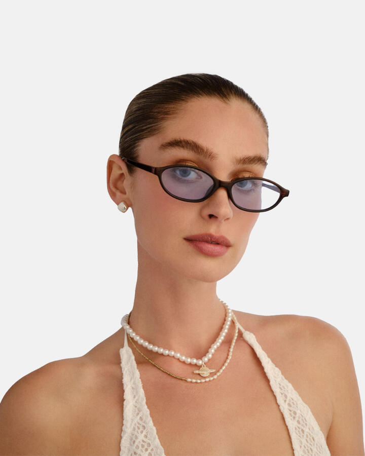 Image of Sunglasses. Productname: Aire Earthshine Sunglasses: Chestnut - Women's Sunglasses in Tan colour by brand - Novo