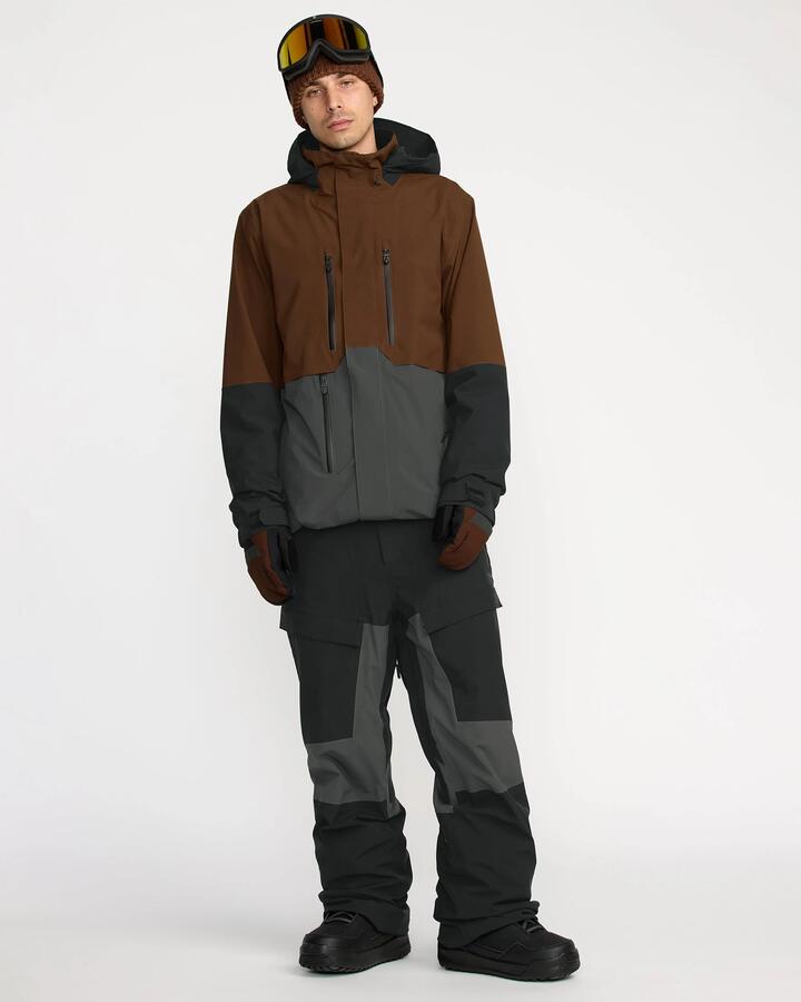 Image of a model wearing Pants. Product name - Volcom Mens Ringe Stretch 30K Snow Pants Black in Black colour by brand - Volcom