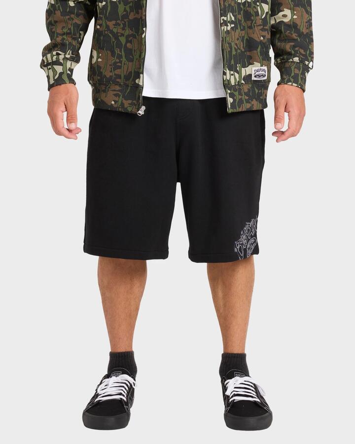 Image of a model wearing Shorts. Product name - Billabong Mens Bad Dog Fleece Corduroy Walkshorts Black in Black colour by brand - Billabong