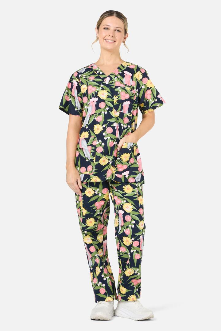 Image of a model wearing Uniforms & Workwear. Product name - Galah scrub set in Navy colour by brand - Scrubs With Love