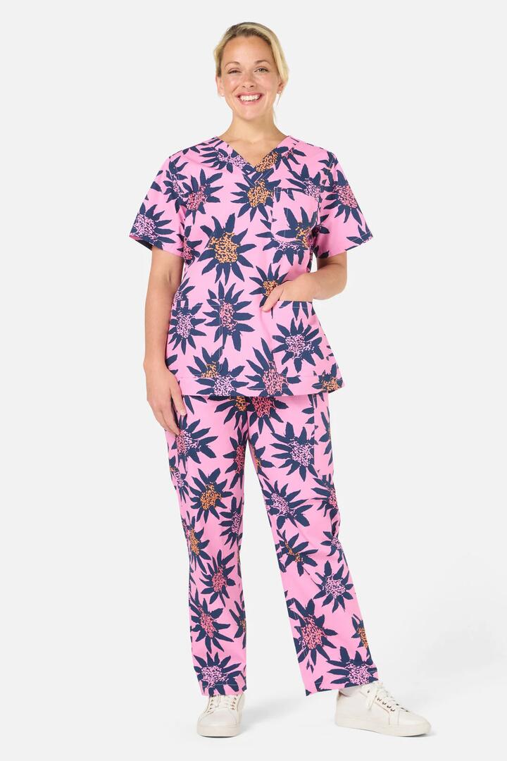 Image of a model wearing Uniforms & Workwear. Productname: Funflower Scrub Set in Pink colour by brand - Gorman