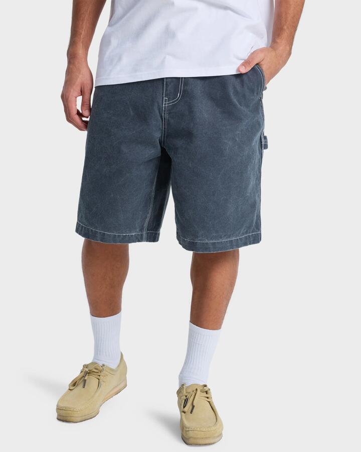 Image of a model wearing Shorts. Product name - Quiksilver Mens Mercury Carpenter Shorts Black in Black colour by brand - Quiksilver
