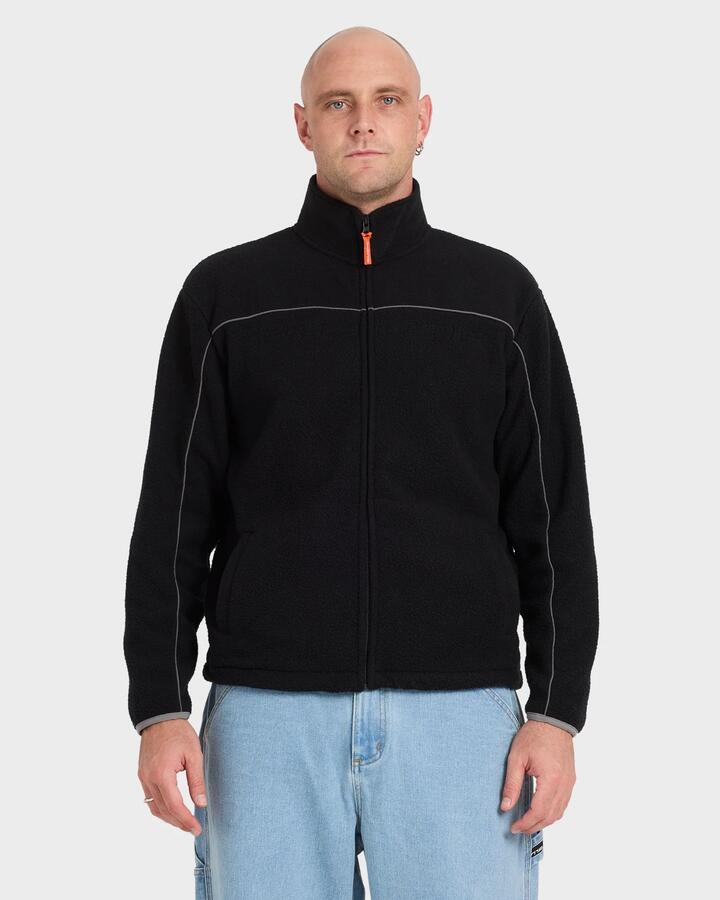 Image of a model wearing Outerwear. Product name - Billabong Mens Spec 73 Polar 1/4 Zip Mock Neck Fleece Top Black in Black colour by brand - Billabong