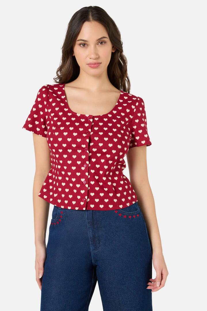 Image of a model wearing Tops. Product name - Sweet Heart Top in Red colour by brand - Princess Highway