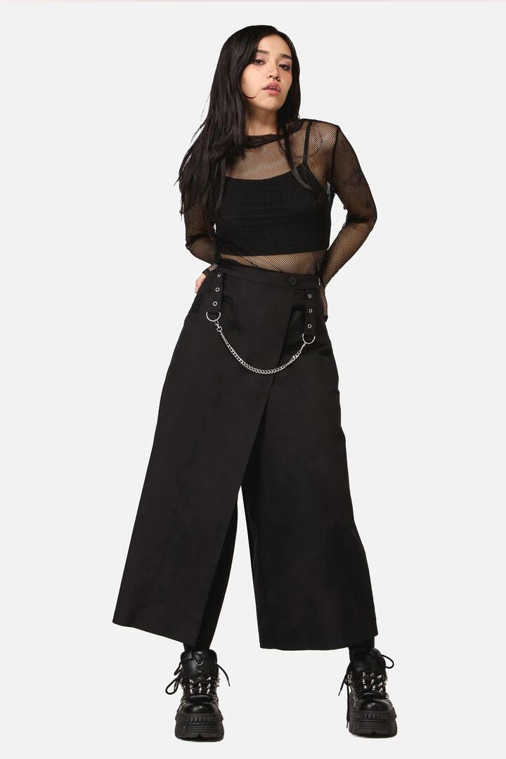 Image of a model wearing Skirts. Product name - Anonymous Midi Skort in Black colour by brand - Dangerfield