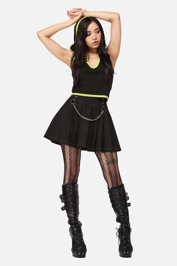 Image of a model wearing Skirts. Product name - Anonymous Pleated Skirt in Black colour by brand - Dangerfield