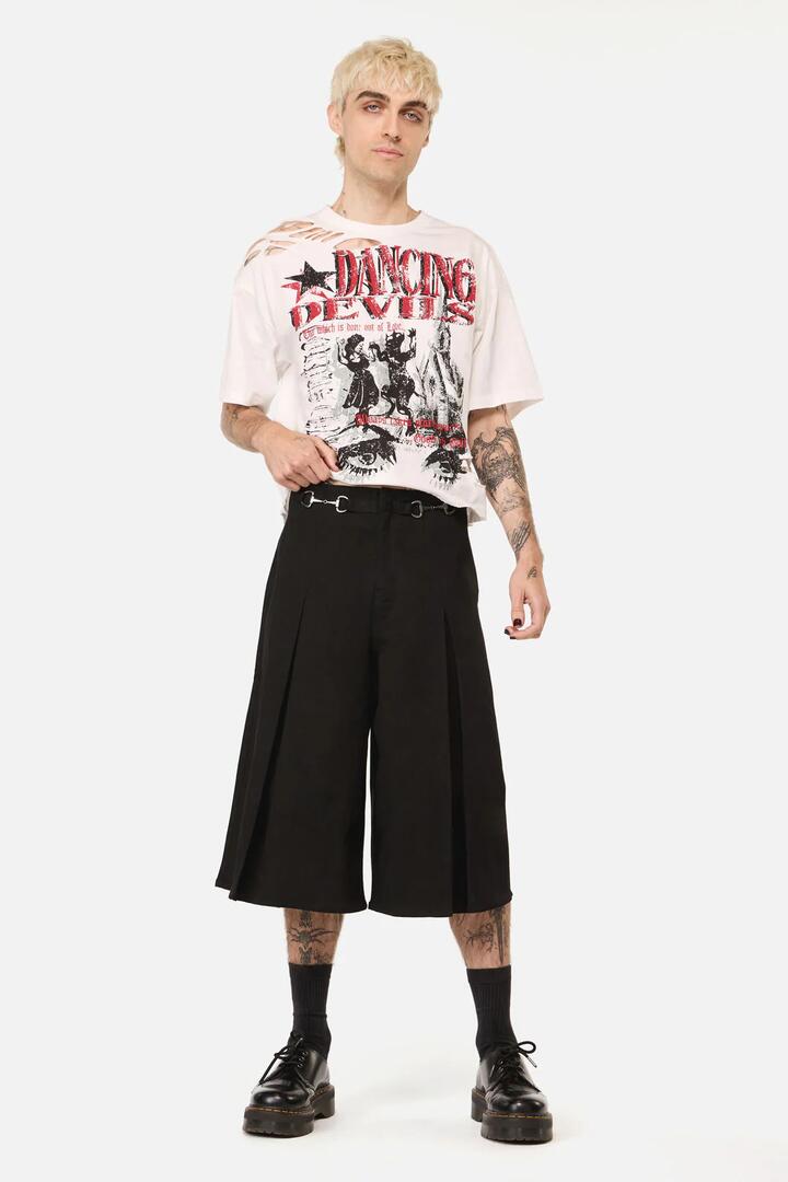 Image of a model wearing Pants. Product name - Dystopia Goth Pleat Pant in Black colour by brand - Black Friday