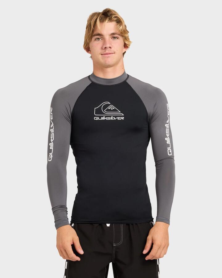 Image of a model wearing Tops. Product name - Quiksilver Mens On Tour Upf 50 Long Sleeve Rashguards Iron Gate in Iron Gate colour by brand - Quiksilver
