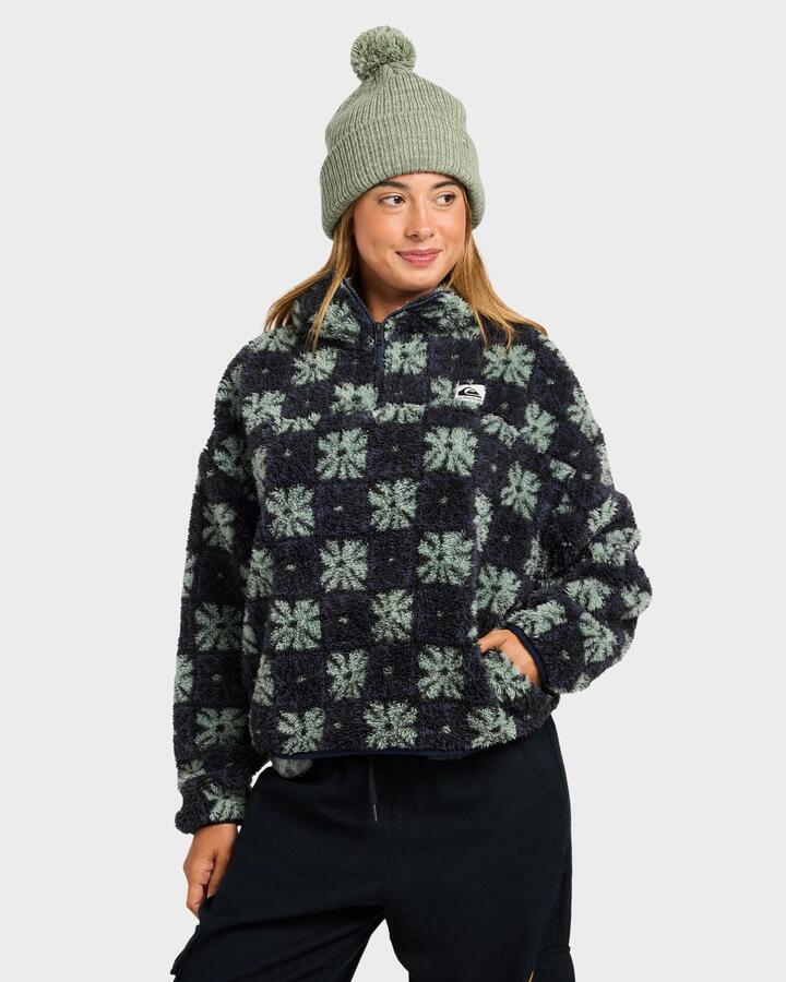Image of a model wearing Outerwear. Product name - Quiksilver Womens Winter Sherpa Quarter Zip Fleece Jumper Blue Nights in Blue Nights colour by brand - Quiksilver