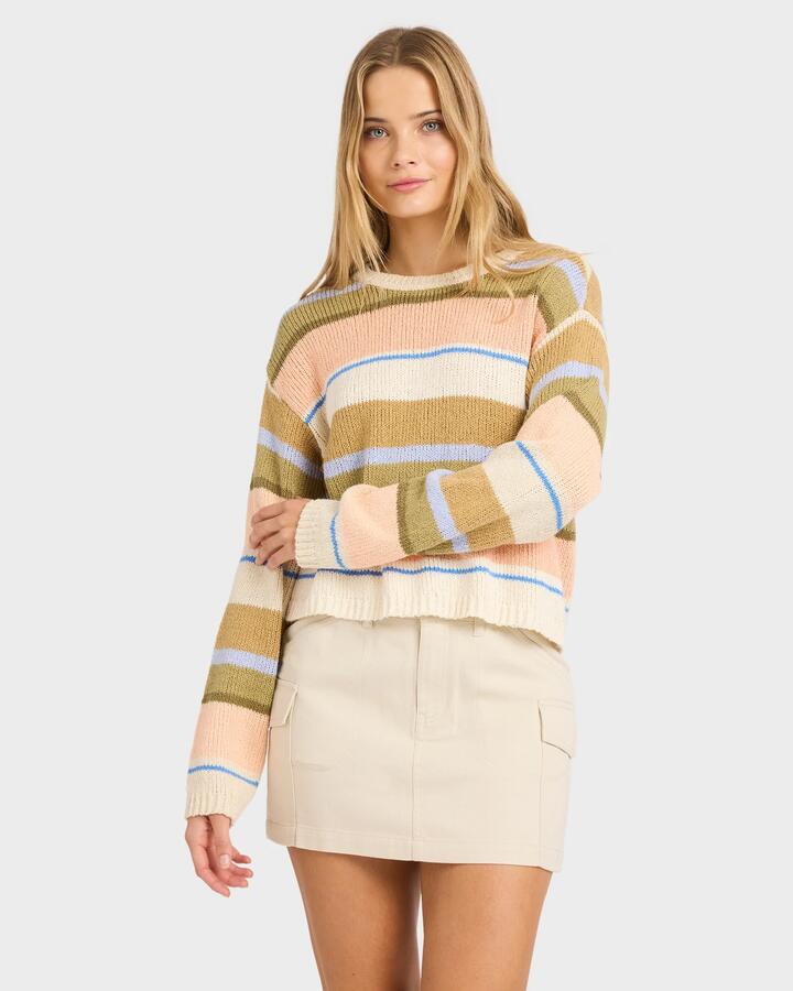 Image of a model wearing Outerwear. Product name - Billabong Womens Bright Sol Crew Neck Sweater Light Peach in Light Peach colour by brand - Billabong