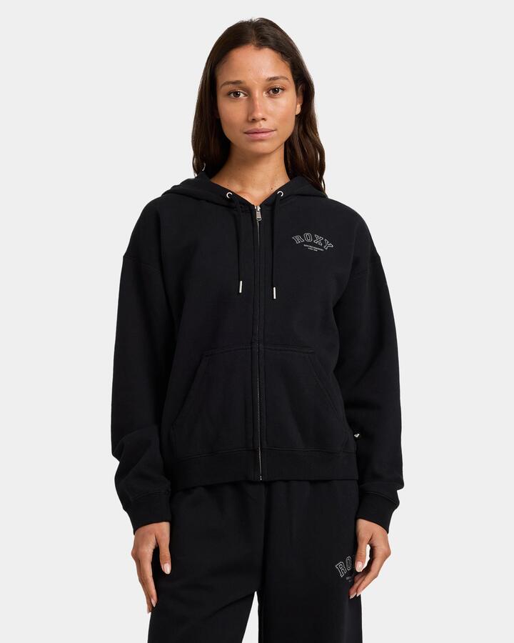 Image of a model wearing Outerwear. Product name - Roxy Womens Dreamy Days Zip Up Hoodie Black in Black colour by brand - Roxy