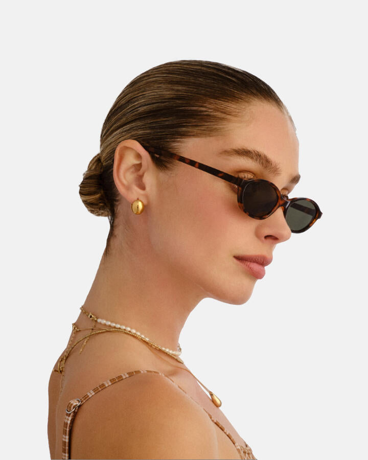 Image of Sunglasses. Productname: Aire Earthshine Sunglasses: Dark Tort - Women's Sunglasses in Dark Tort colour by brand - Novo