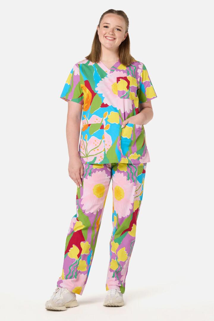 Image of a model wearing Uniforms & Workwear. Product name - In my Garden scrub set in Multi colour by brand - Gorman