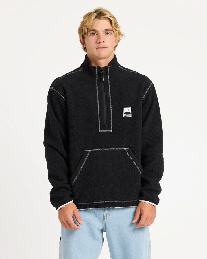Image of a model wearing Outerwear. Product name - Quiksilver Mens Mercury Polar 1/2 Zip Fleece Jumper Black in Black colour by brand - Quiksilver