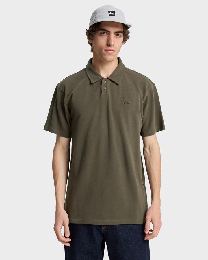 Image of a model wearing Shorts. Product name - Quiksilver Mens Mw Pique Polo Short Sleeve Shirt Grape Leaf in Grape Leaf colour by brand - Quiksilver