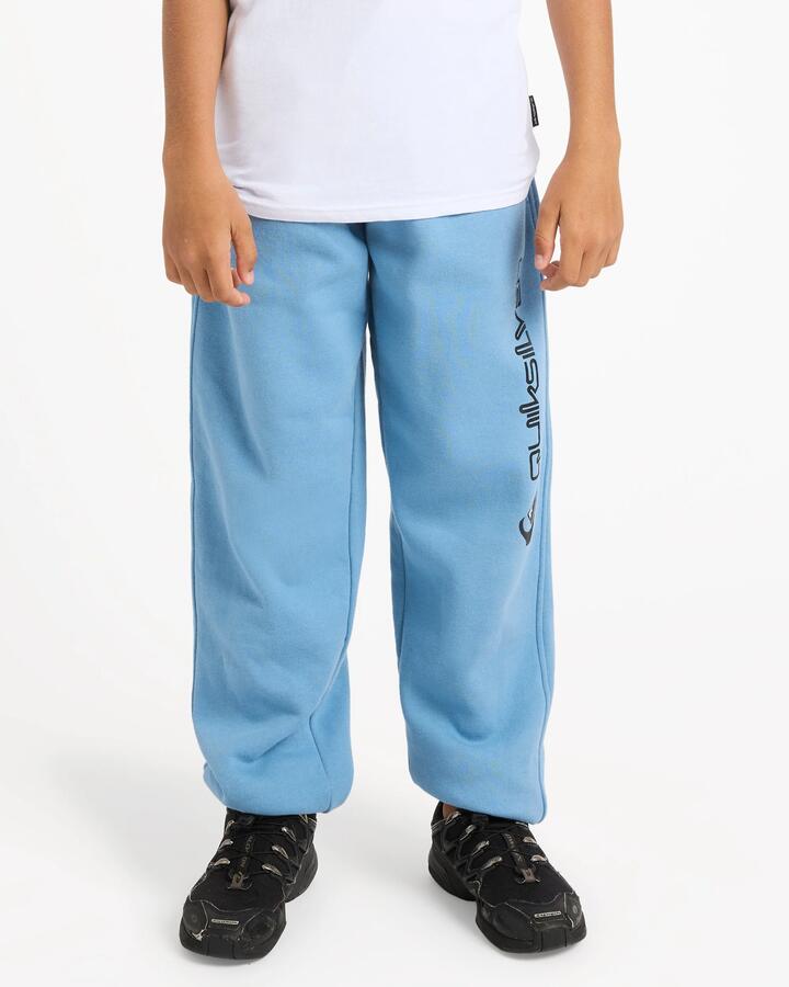 Image of a model wearing Pants. Product name - Quiksilver Boys 8-16 Screen Trackpants Riviera in Riviera colour by brand - Quiksilver
