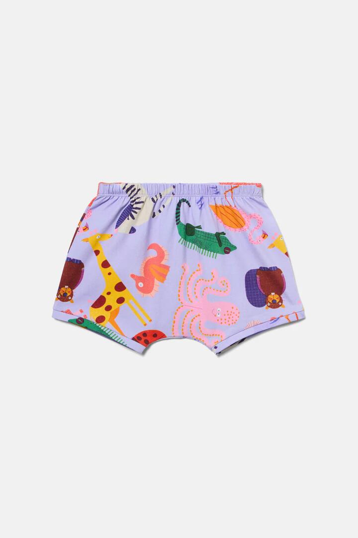 Image of a model wearing Shorts. Product name - Zoo Tropics Baby Shorts in Lilac colour by brand - Gorman