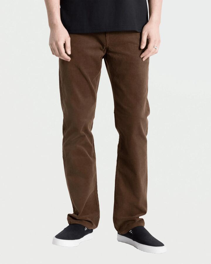 Image of a model wearing Pants. Product name - Volcom Mens Solver 5 Pocket Pants Brown Stone in Brown Stone colour by brand - Volcom