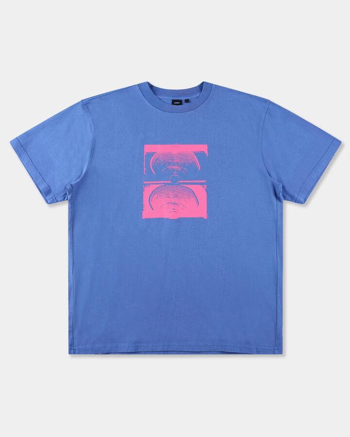 Image of a model wearing Tops. Productname: former Mens Crux Overdye T-Shirt Cobalt - in Cobalt colour by brand - Former