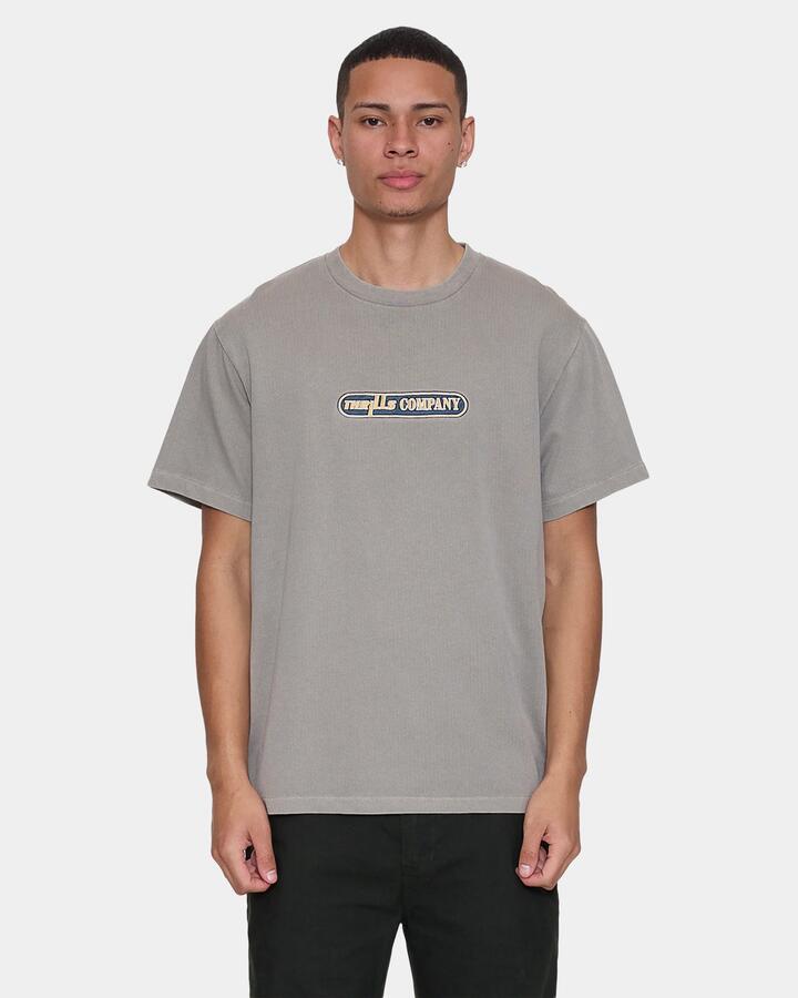 Image of a model wearing Tops. Productname: thrills Mens Paradise Falling Embro T-Shirt Fog - in Fog colour by brand - Thrills