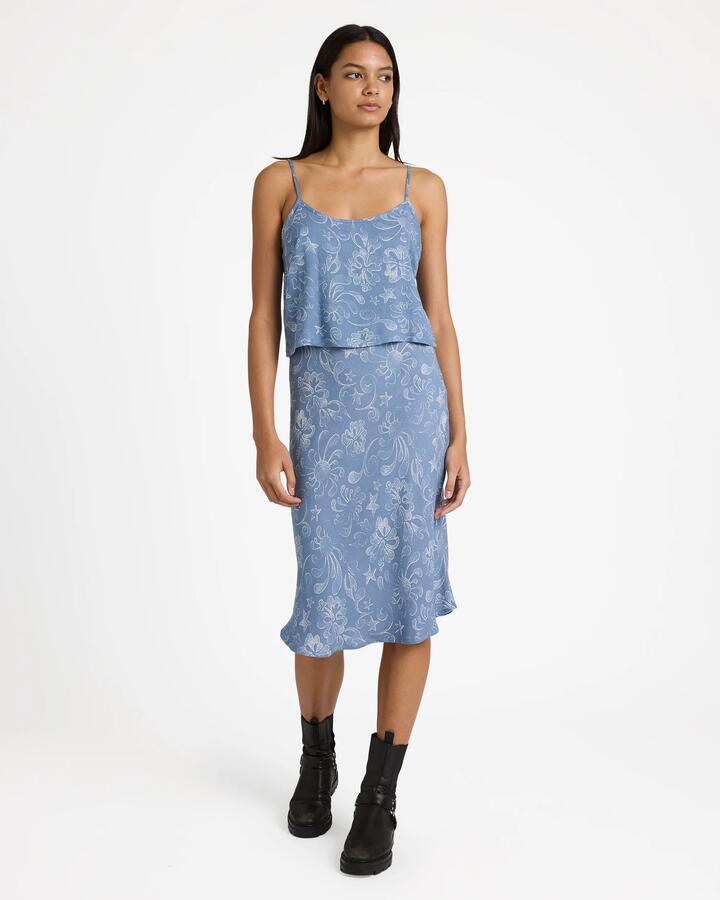 Image of a model wearing Skirts. Productname: rvca Womens Sub Aloha Midi Skirt Light Blue - in Light Blue colour by brand - Rvca