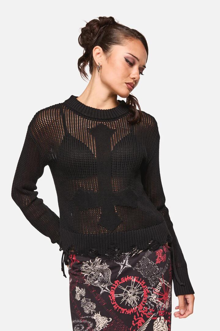 Image of a model wearing Tops. Product name - Crossed Distressed Goth Knit in Black colour by brand - Black Friday