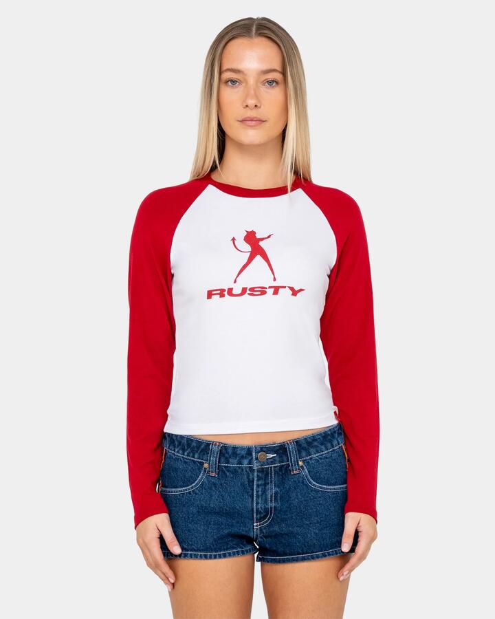 Image of a model wearing Tops. Product name - Rusty Womens Devil Raglan Long Sleeve T-Shirt White in White colour by brand - Rusty