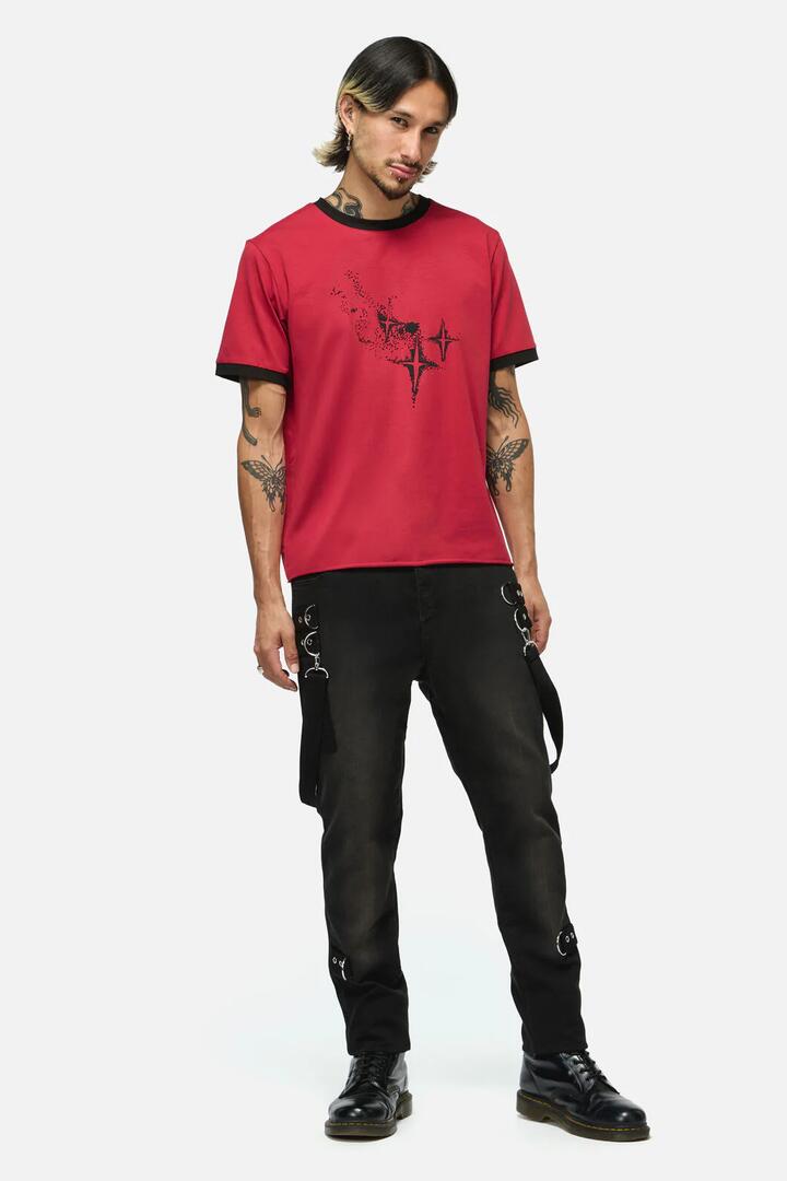 Image of a model wearing Tops. Product name - Suffer Unisex Crop Tee in Red colour by brand - Black Friday