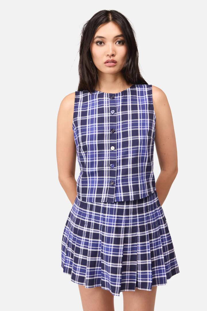 Image of a model wearing Tops. Product name - Whirl Tartan Button Top in Purple/White colour by brand - Dangerfield