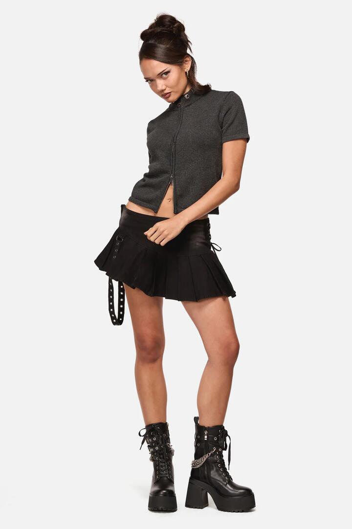 Image of a model wearing Skirts. Product name - Afterlife Goth Mini Skort in Black colour by brand - Black Friday