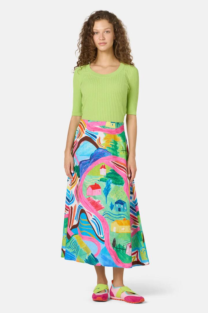 Image of a model wearing Skirts. Product name - Mountain Magic Midi Skirt in Print colour by brand - Gorman