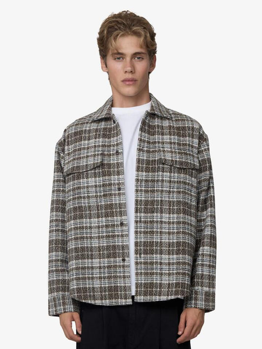 Image of a model wearing Outerwear. Productname: Article One Dillon Overshirt in Military colour by brand - Article One