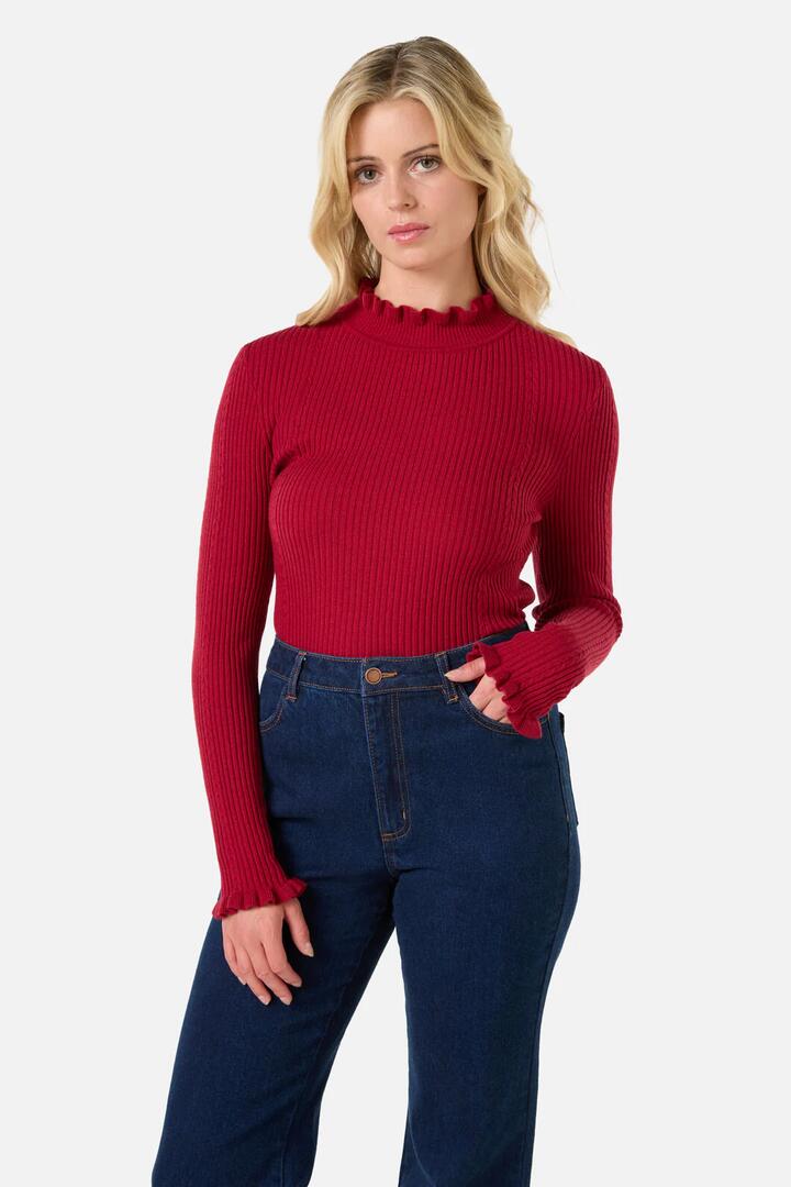 Image of a model wearing Tops. Productname: Odessa Knit Top in Black colour by brand - Princess Highway