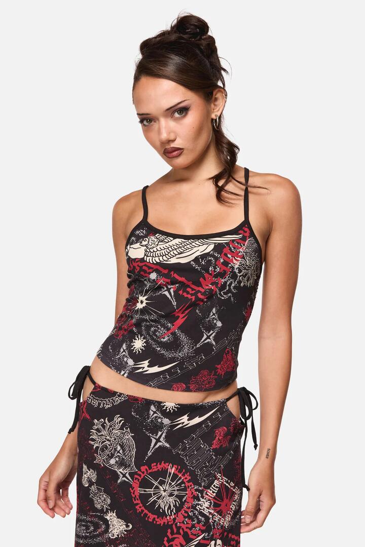 Image of a model wearing Tops. Product name - Purgatory Tank in Black colour by brand - Black Friday