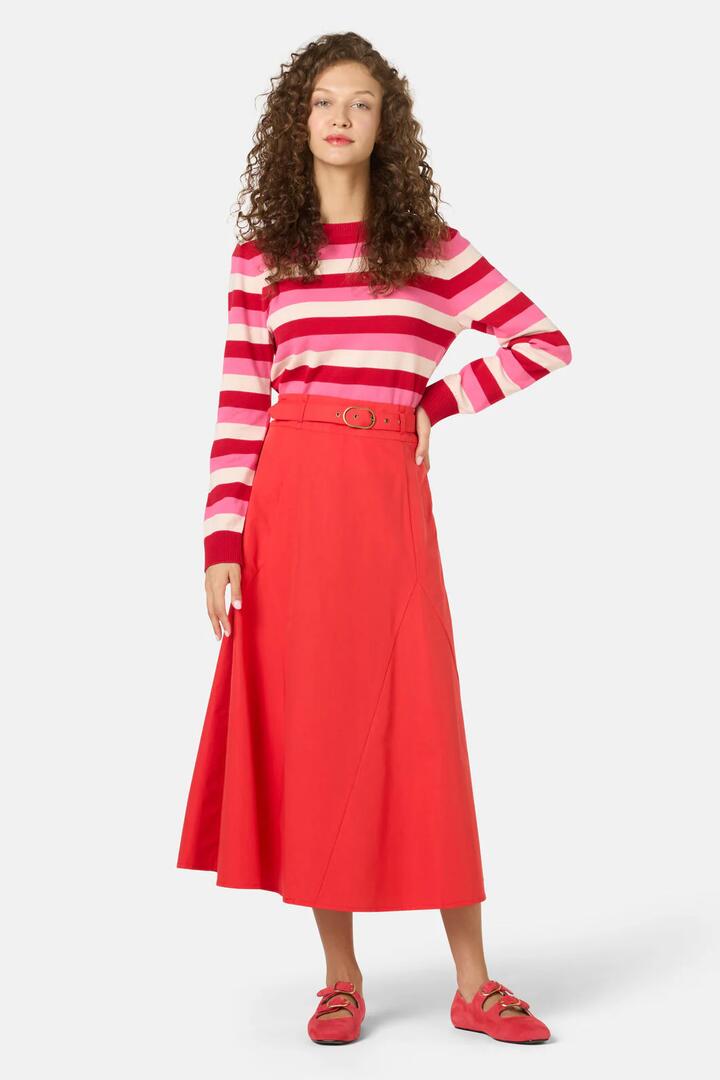 Image of a model wearing Skirts. Product name - Peony Midi Cotton Skirt in Red colour by brand - Gorman